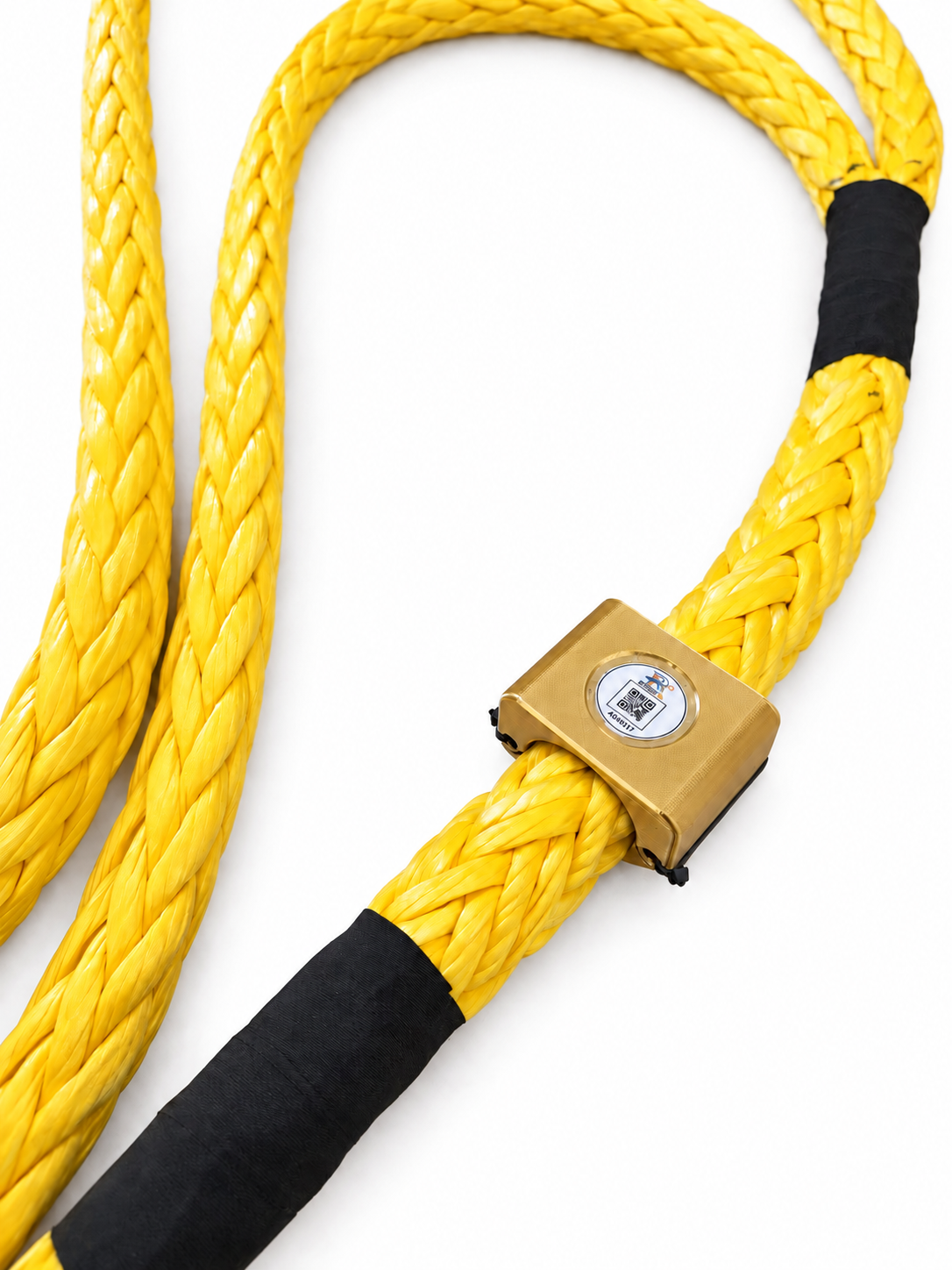 Gold RopeID® tag mounted on a yellow synthetic rope with black protective sleeves